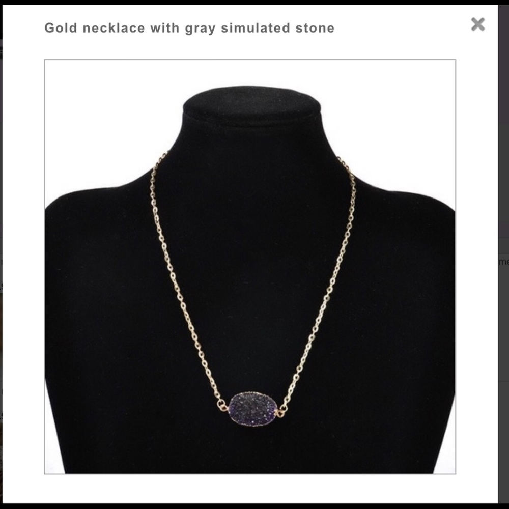 Gold necklace with gray simulated stone